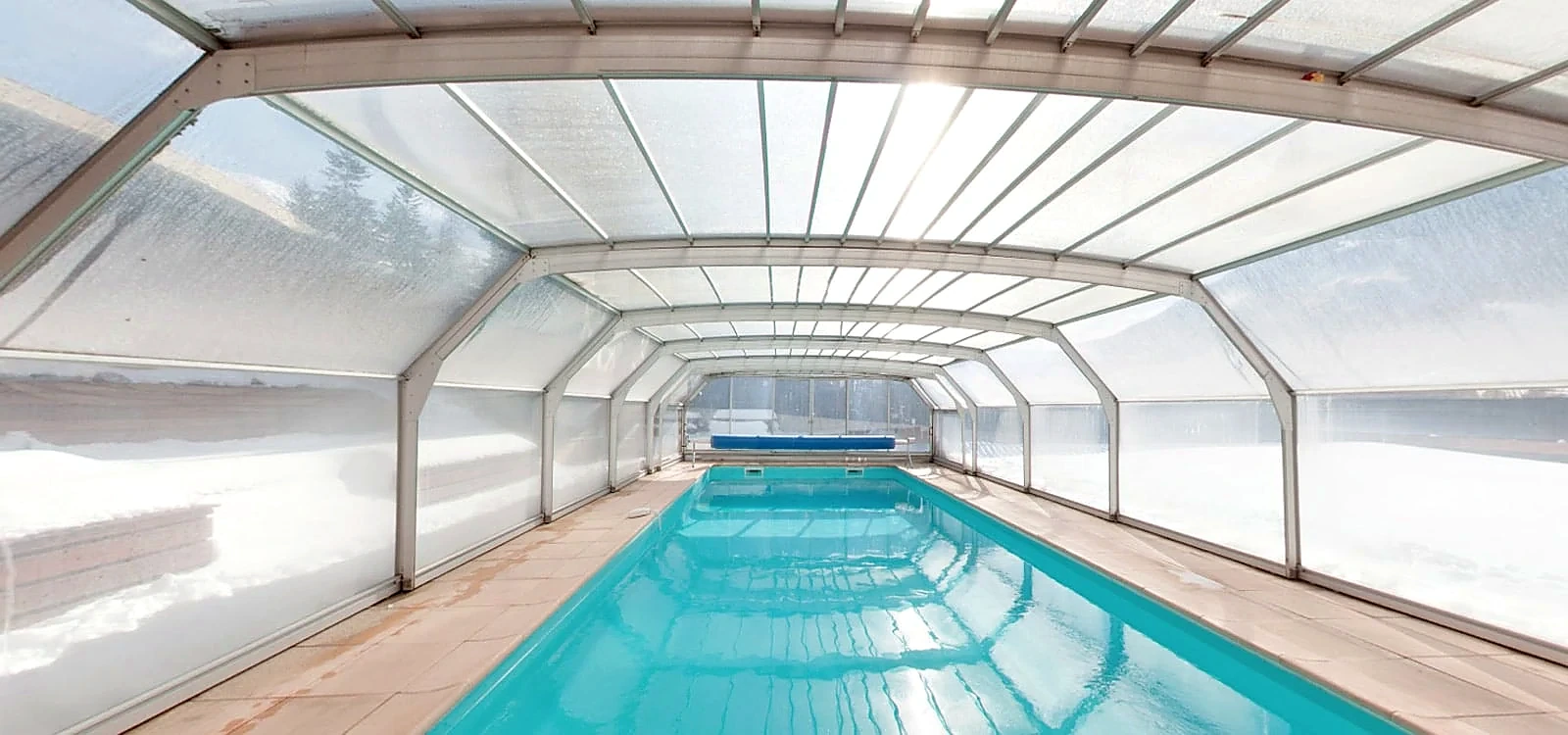 The heated covered pool at Hôtel Plein Sud